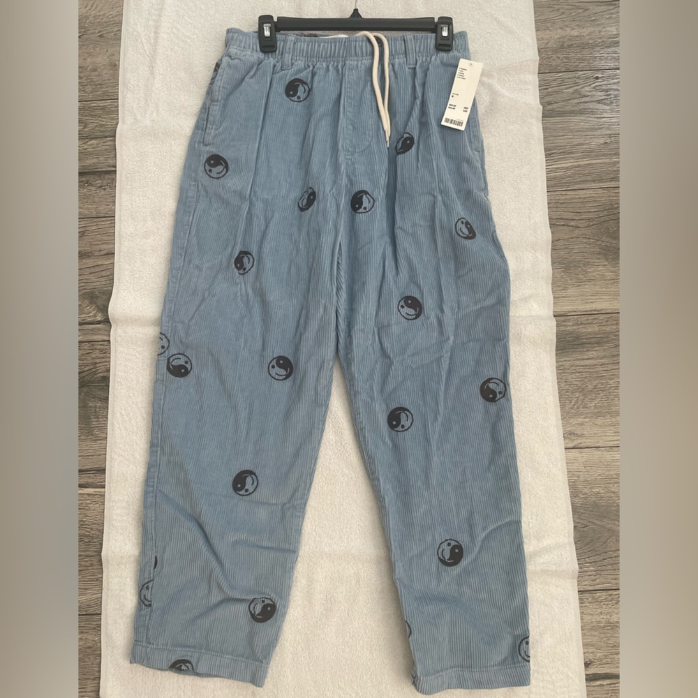 Baby blue smiley corduroy pants from Urban Outfitters. NWT.